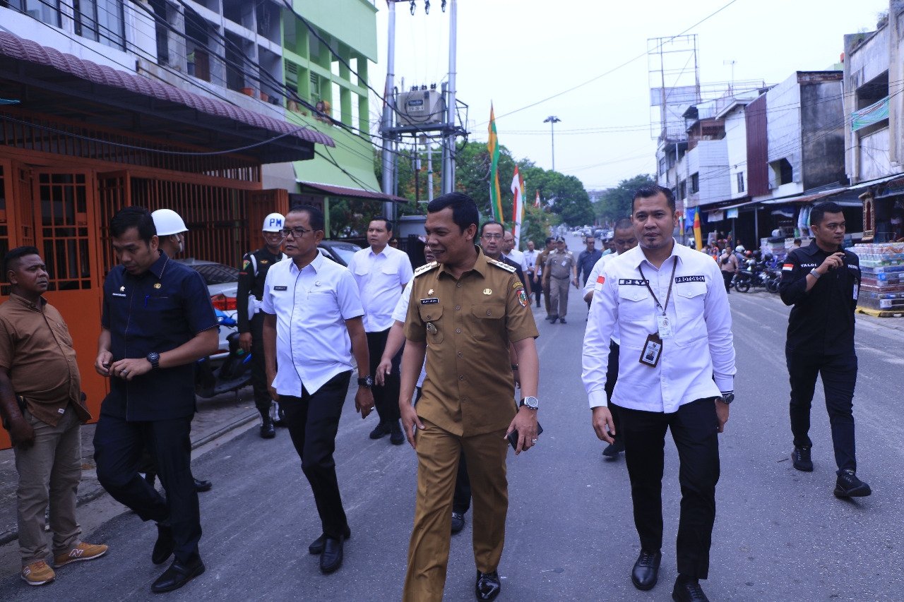 Pj Walikota Muflihun Sambut Langsung Kedatangan Presiden RI Jokowi